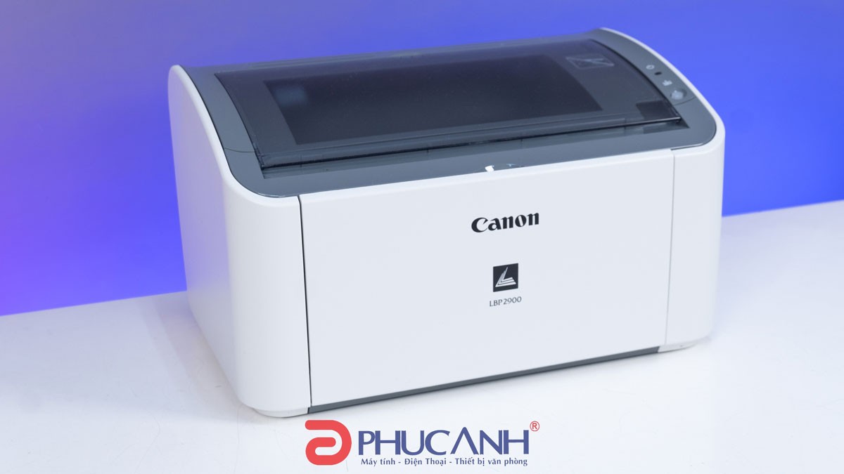 Máy in laser Canon LBP2900 màu trắng đặt trên mặt bàn