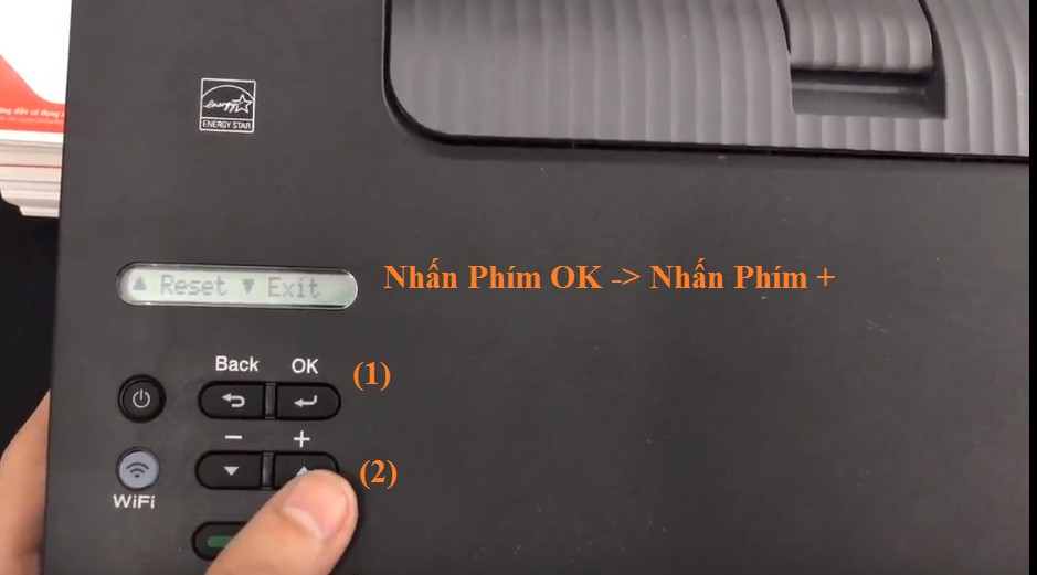 reset Drum máy in Brother 2366dw - Bước 3: Màn hình sẽ hiển thị hai thông báo (Reset và Exit)