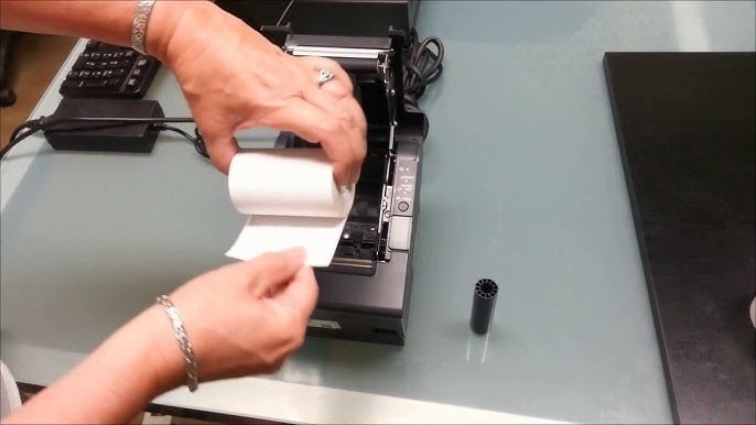 Thay giấy in nhiệt mới là giải pháp khắc phục mực in bị mờ