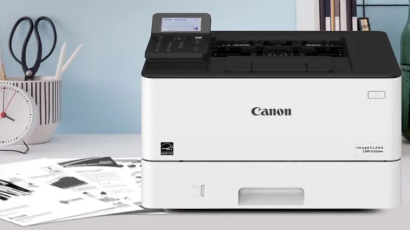 Logo Canon và dòng chữ 'Business Machines' trên máy in