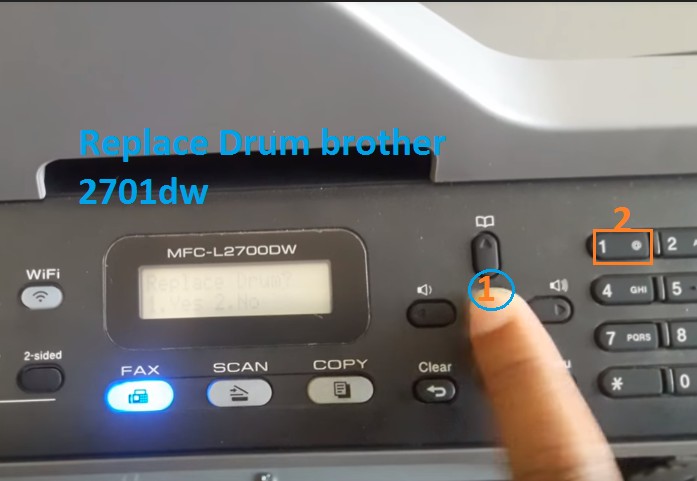 Giao diện máy in Brother 2701D hiển thị thông báo reset drum
