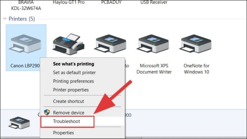 Chọn Troubleshoot để công cụ tự động tìm và sửa lỗi máy in