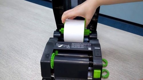 Điều chỉnh vị trí giấy in trong máy in mã vạch
