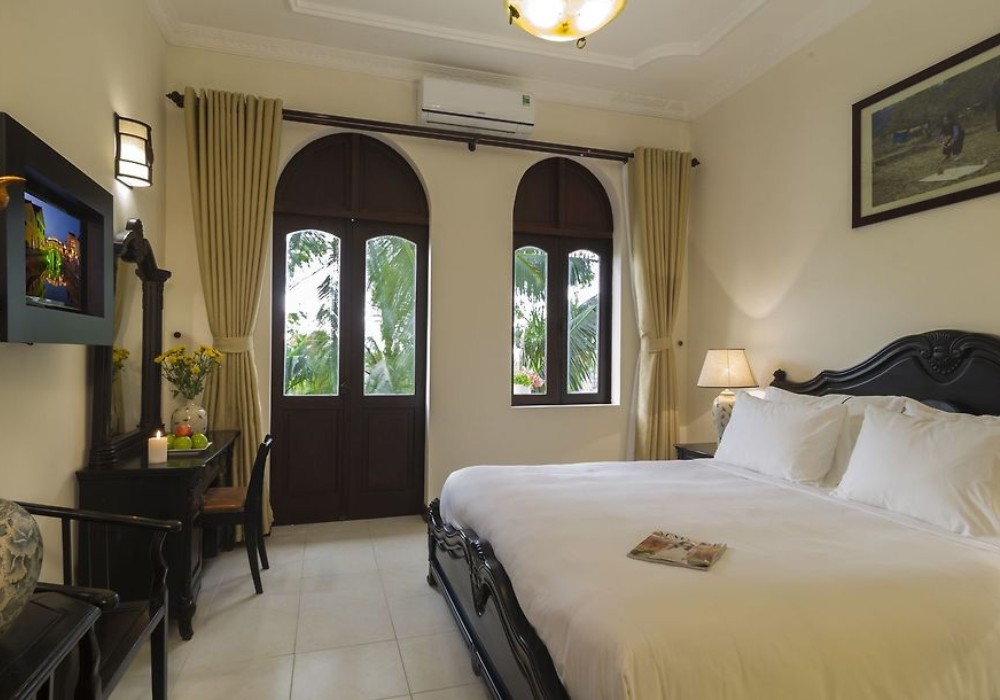 Nội thất phòng ngủ pha trộn Indochine và hiện đại