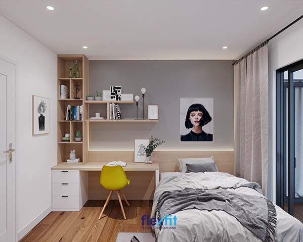 Góc bàn làm việc với cây cảnh nhỏ trong chậu và hộc tủ, làm sinh động không gian làm việc trong phòng ngủ